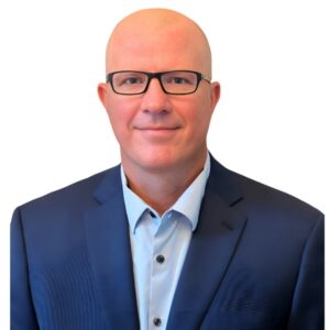 An image of our business advisor, Darren, wearing a suit with a white background