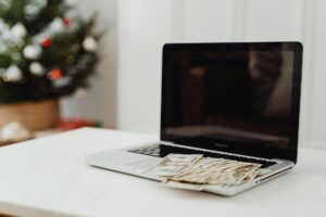 laptop and money