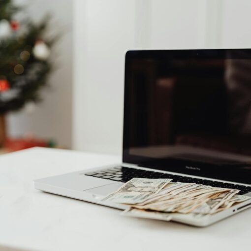 laptop and money