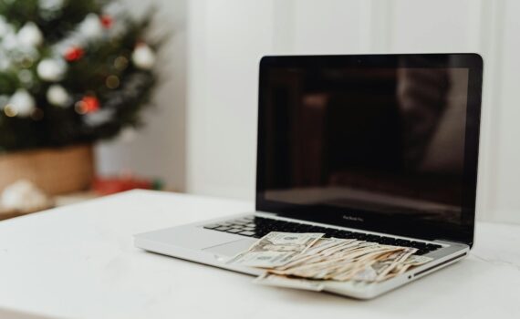 laptop and money