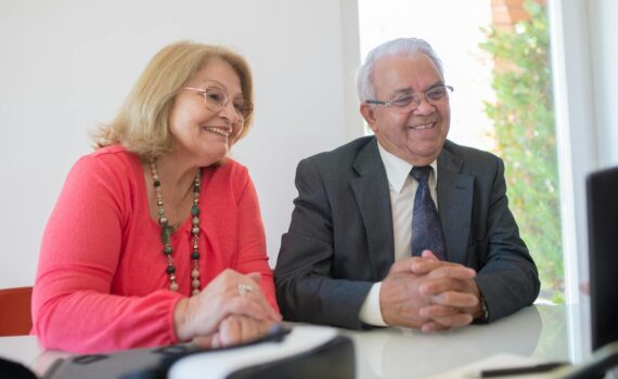smiling elderly couple