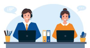Cartoon image of two people, one man and one woman, wearing headsets and sitting at computers